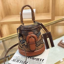 outlet shoulder bag cute trend bear graffiti bucket bag street personality vertical leathers cylinder handbags elegant stereotypes printed leather handbag 66243