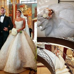 2021 Luxury Cathedral Wedding Dresses Plus Size Spaghetti Straps Arabic Sequined Bridal Gowns Custom Made Heavy Beaded Wedding Dress