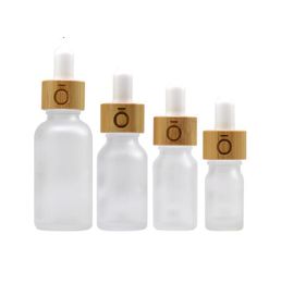 2021 New 5ml 10ml 15ml 20ml 30ml 50ml oil bottle with bamboo essence in frosted glass 1000pcs wholesale