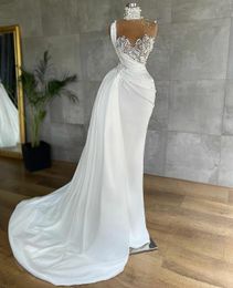 2022 Sexy Mermaid Prom Dresses Luxurious Pearls Beaded High Neck Illusion Top Formal Evening Party Gowns Lace Appliques Peplum Ruched Robe de mariée