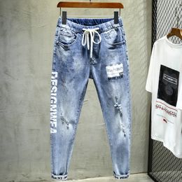 Elastic denim Jeans Fashion design letters printed Small feet jeans Hip Hop Drawstring joggers Plus size 38 Men's Harem Pants 201116