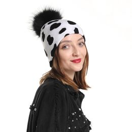 New Fashion Cow Print Hat Warm Knitted Winter Real Fur Pompom Hats For Women Girls Black Pom Pom Beanie Cap Y201024