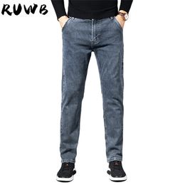 Jeans da uomo di marca stile classico invernale Pantaloni casual in denim elasticizzato da lavoro Pantaloni neri azzurri da uomo con taglie forti