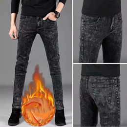 Wholesale 2021 winter thicken black trendy brand jeans men's slim stretch pants male handsome Korean casual pencil trousers