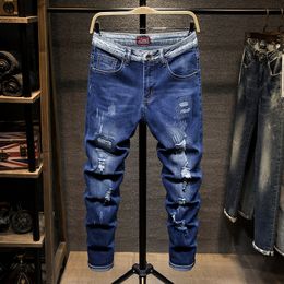 Mens Jeans الأزياء العلامة التجارية ممزق الرجال سراويل نحيفة رجل رعاة البقر ديميين سراويل الذكور 9515