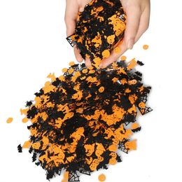 Halloween venue layout throwing confetti pumpkin spider web witch bat sequin