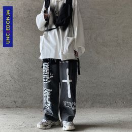 UNCLEDONJM Cross Graffiti Denim Jeans Men's High Street Loose Pants Elastic Waist Pants Vintage mens jeans MC-3049 201111