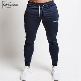SITEWEIE Sportswear Fitness Pants Men Gyms Skinny Sweatpants Outdoor Cotton Track Pant Bottom Jogger Workout Trousers L244 201221