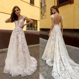 Gorgeous A Line Wedding Dresses Full Appliqued Lace Illusion Sheer Bridal Gowns Sexy Backless Robes De Mariée Sweep Train