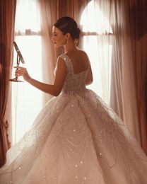 Glamorous Mermaid Wedding Dresses Sheer Long Sleeves Beaded Sequins Bridal Gown Custom Made Appliques Backless Robes De Mariée