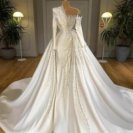 elegant heavy pearls wedding dresses with detachable train long sleeves satin beaded bridal gowns custom made luxury robes de marie