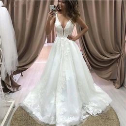 Setwell Deep V-neck A-line Wedding Dresses Sleeveless Backless Lace Appliques Floor Length Long Train Bridal Gowns