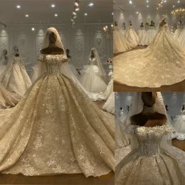 2022 Champagne Ball Gown Wedding Dresses with Lace Applique Crystals Beaded Short Sleeves Chapel Train Off the Shoulder Neckline Custom Made Dubai Vestidos De