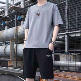 Men Korean Fashion Short Sleeve Tracksuit Summer Two Pieces Set Tshirts And Short Pants For Male Causal Loose Sports Set Clothes G1222