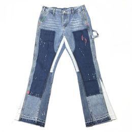 Jeans svasati con schizzi di vernice blu multicolore Pantaloni patchwork da uomo Stile a otto tasche