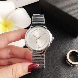 Men's Luxury Watch Brand Quartz Wrist Watch for Women Girl Big Letters Crystal Metal Steel Band Watches Men Gift