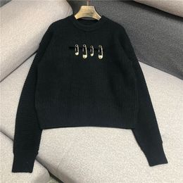 Luxury Designer Brand Knitted Sweater for Women Fashion O Neck Sexy Hollow Out Pin Buckle Black Loose Knitted Pullover Sweater LJ201112