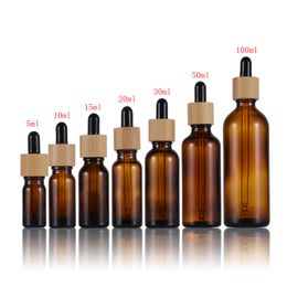 100pcs/lot 5ml 10ml 15ml 20ml 30ml 50ml 100ml Empty glass Dropper Oil Essential Bottle Bamboo cap Refillable Drop Liquid Bottles