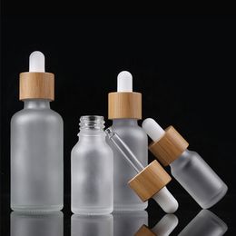 High End Boston Round Glass Beard Oil Body Oil Bottle with Bamboo Dropper Lid 5ml 10ml 15ml 20ml 30ml 50ml 100ml Frosted Clear Glass Tincture Bottle Wholesale