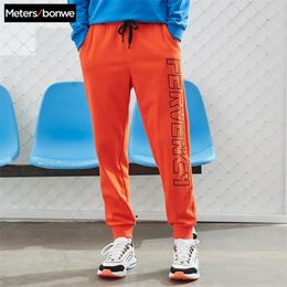 Metersbonwe Men Handsome Sport Pants New Spring Autumn letter Printing Beam feet Jogging Pants Fashion Sports Male Brand Pants LJ201104