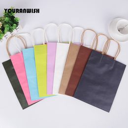 pink paper gift bags wholesale UK - 20pcs lot White Pink Purple Sky Blue Coffee Kraft paper Gift bag with handle wedding birthday party gift package bags Y1121