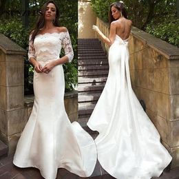 2021 Mermaid Wedding Dresses with Jacket Sexy Backless Lace Applique Crystals Pearls Buttons Bow Custom Made Wedding Bridal Gown Vestidos