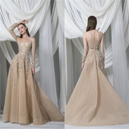 Sexy abito da sera trasparente con paillettes champagne maniche lunghe abito da ballo con perline appliqued vendita calda sweep treno abito su misura Robe de soir￩e