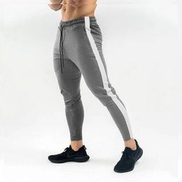 SS Sonbahar Yeni Erkekler Spor Sweatpants Erkek Spor Salonları Vücut Geliştirme Egzersiz Pamuk Pantolon Rahat Joggers Spor Kalem Pantolon