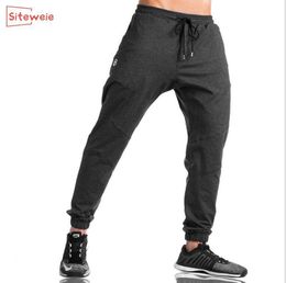 SITEWEIE Men's Sports Pants Stretch Slim Pants Cotton JoggresSportswear Tracksuit Bottoms Skinny Sweatpants Gyms Trousers G250 201109