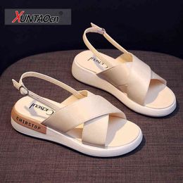 Nxy Sandals Women's Summer Flat Fashion Simple Casual Ladys Shoes Buckle White Reflective Tape Platform 0210