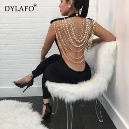 Hot Sale Pearl Chain Sexy Backless Jumpsuit Women Sleeveless Skinny Bodycon Rompers Women Party Overalls Casual Tassel Playsuits T200107
