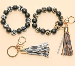 Black and white Colour Tassel Wood Beads Keychain Wrist Strap Bracelet For Women Keys Pu Leather Keyring Jewellery Gifts de095