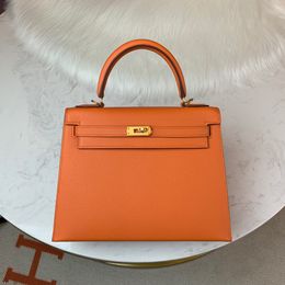 orange deliveries NZ - designed handbag,25cm,half handmade quality, epsom leather,orange color, wax thread, gold and silver hardware,wholesale price,fast delivery,contact me for details