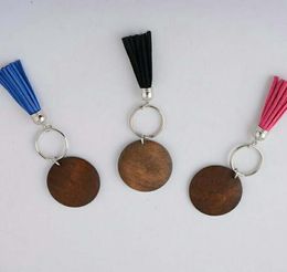 Foreign trade monogram wooden disc keychain personality Korean version of velvet tassel pendant key ring