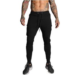 Men Gyms Long pants Cotton Men's Sporting workout fitness Pants casual Fashion sweatpants jogger pant skinny Trousers 618777600105
