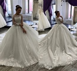 Ball Gown Wedding Dresses Sheer Neck Long Sleeves 2021 Arabic Aso Ebi Bridal Gowns Lace Appliqued Beaded Formal Plus Size Vestidos AL7673