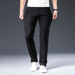 BROWON New Arrival Men's Pant Spring Summer Breathable Solid Color Mid Straight Loose Men Trousers Plus Size 42 201110
