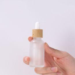 Empty Cosmetic Glass Dropper Bottle 5ml-100ml Clear Essential Oil Bottle With Bamboo Dropper Cap In Stocks