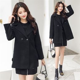Black cloth coat winter new han edition dress in long loose wool coat type cocoon coat 201218