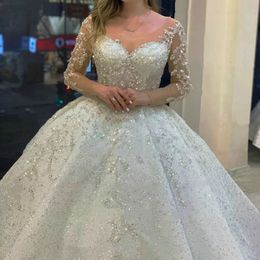 Dubai Luxury Crystals Beaded Ball Gown Wedding Dresses Glitter Sequins V-Neck Long Sleeve Bridal Gowns Chapel Bride Dress Custom Made