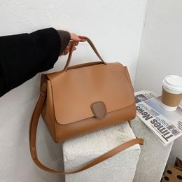 Soft leather large capacity women's handbag solid color retro fashion shoulder bag versatile bag massage bag