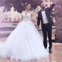 2022 Arabic Dubai Spring Garden A Line Wedding Dress For Bride Illusion Long Sleeves Appliques Lace Full Length Tulle Bridal Gowns Country Wedding Dresses