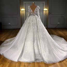 Abiti da sposa di lusso con perline lucide di Dubai Maniche lunghe Abito da sposa con fiori 3D Abiti da sposa con paillettes di cristallo 2020