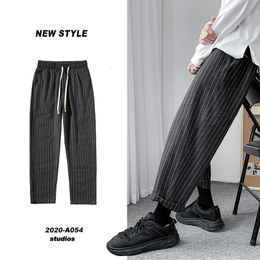 Korean Men's Striped Harem Pants Streetwear Man Casual Loose Trousers Japanese Men Black Grey Plus Size