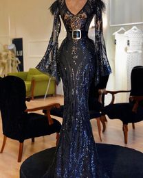 Sparkly Black Feather Mermaid Prom Dresses Bell Long Sleeve 2021 Appliqued Sequined Lace Formal Evening Gown Deep V-Neck Women Party Wear