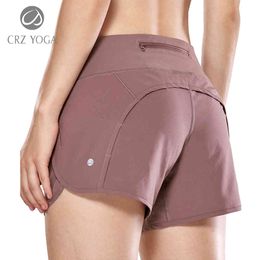 CRZ YOGA Women's Workout Sports Running Shorts Pants With Zip Pocket - 4 inch