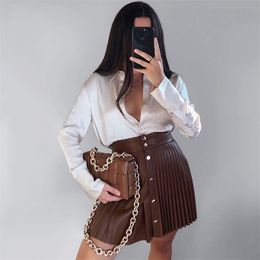 solid pu leather skirt high waist buttons sexy mini pleated Asymmetrical fashion faldas cortas za women autumn 210607