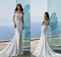 2021 Modern Off The Shoulder Mermaid Wedding Dresses Illusion Long Sleeve Lace Appliqued Beach Boho Bridal Gowns Sweep Train Vestidos AL8787