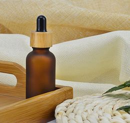 2021 5 10 15ml 30ml 50ml Frosted/ clear Amber Glass Dropper Bottle with Bamboo Cap 1oz Glass Bamboo Essential Oil Bottle free shipping