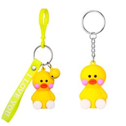 Cute sitting cartoon little yellow duck key chain pendant soft rubber strip alloy small bell accessories small animal keychain